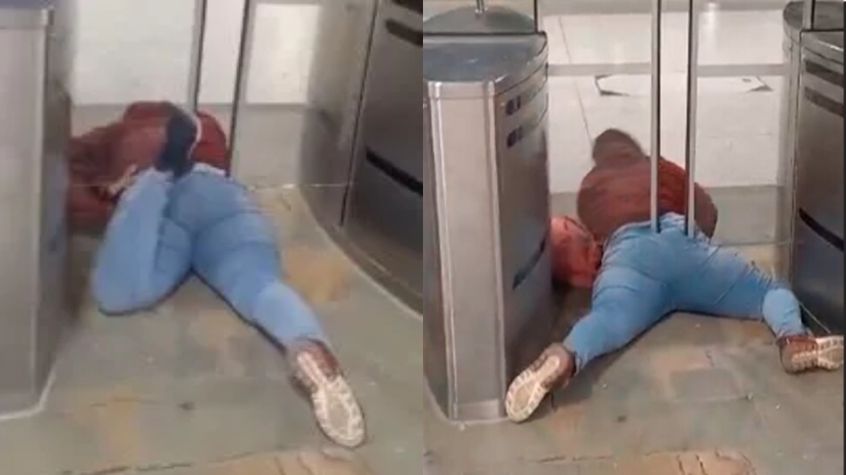 ¡Bochornoso! Una mujer terminó atascada en un torniquete de TransMilenio al intentar colarse